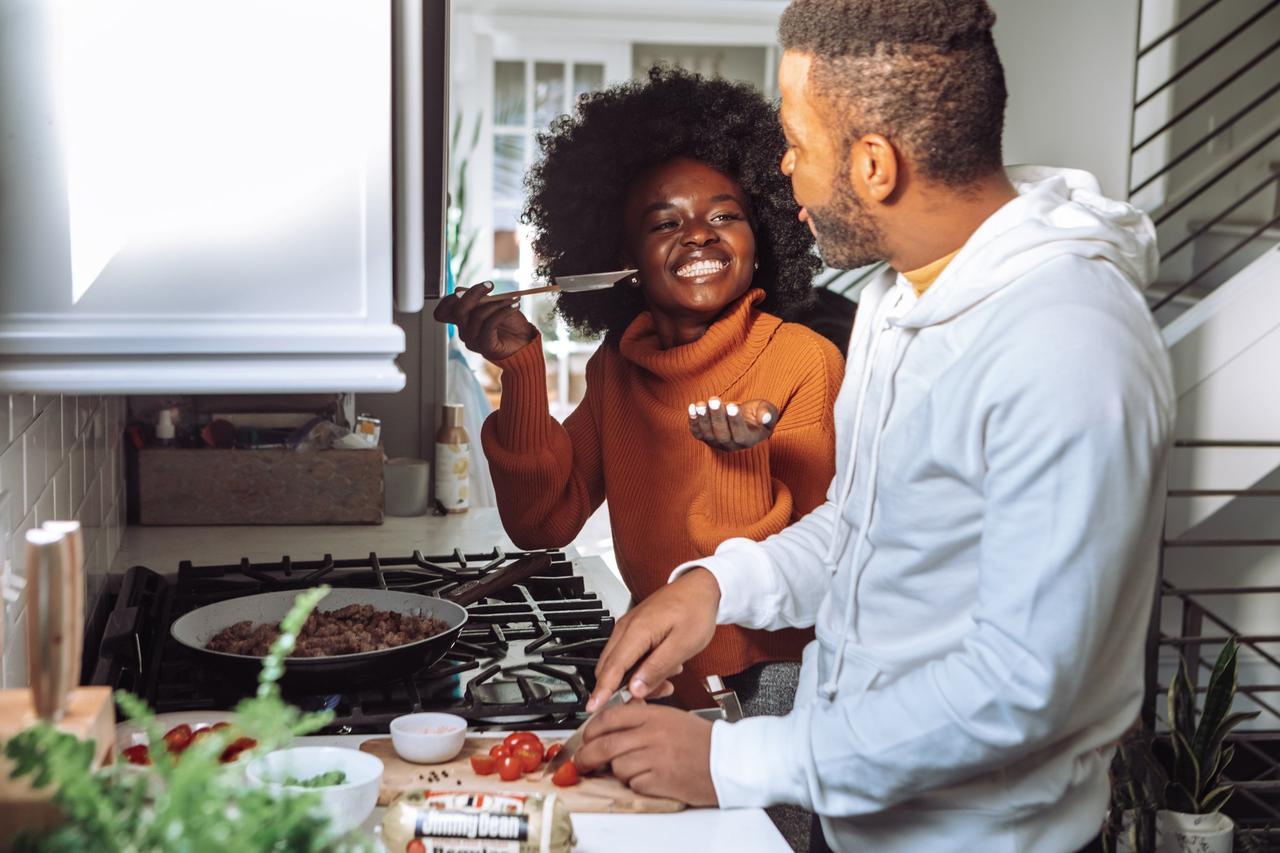 Couple cooking together