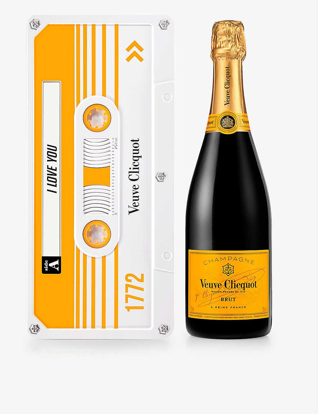 Champagne with a tin in the shape of a cassette