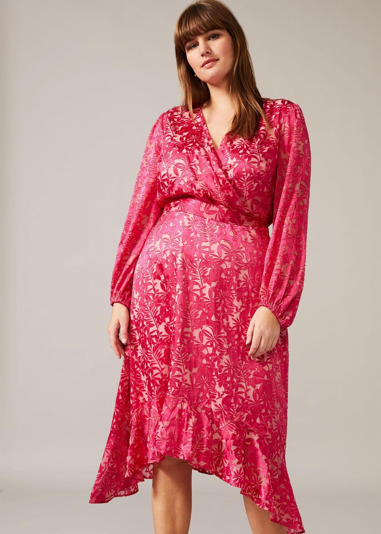 Model wearing a floral pink wedding guest dress
