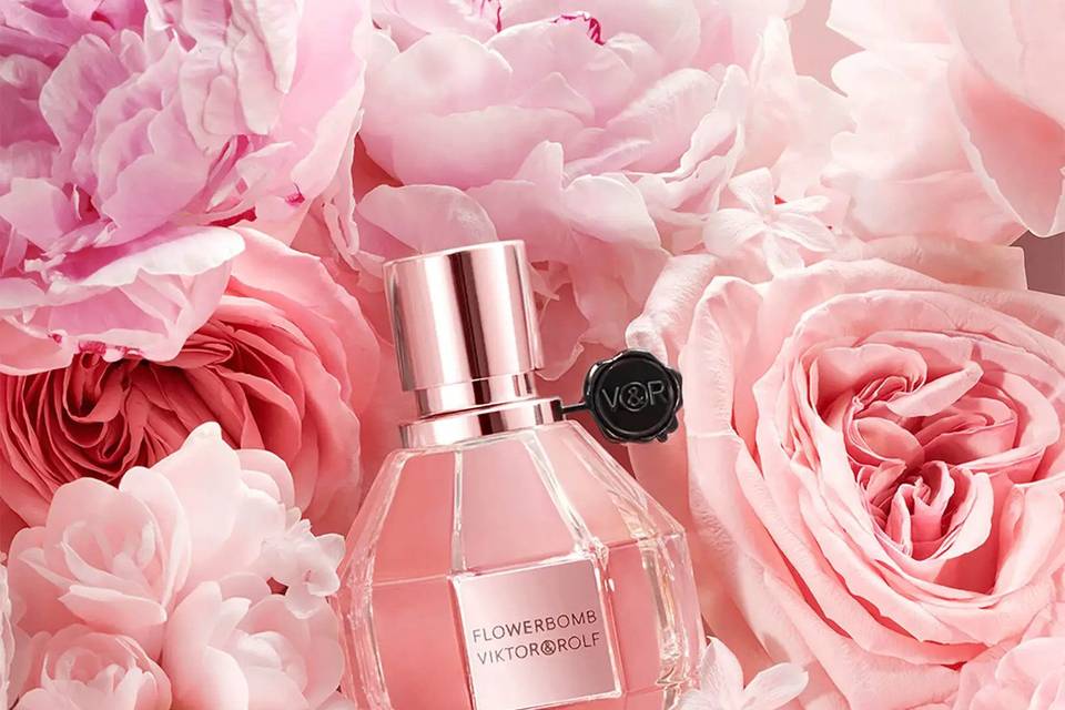 Viktor & Rolf Flowerbomb wedding perfume displayed on a bed of roses