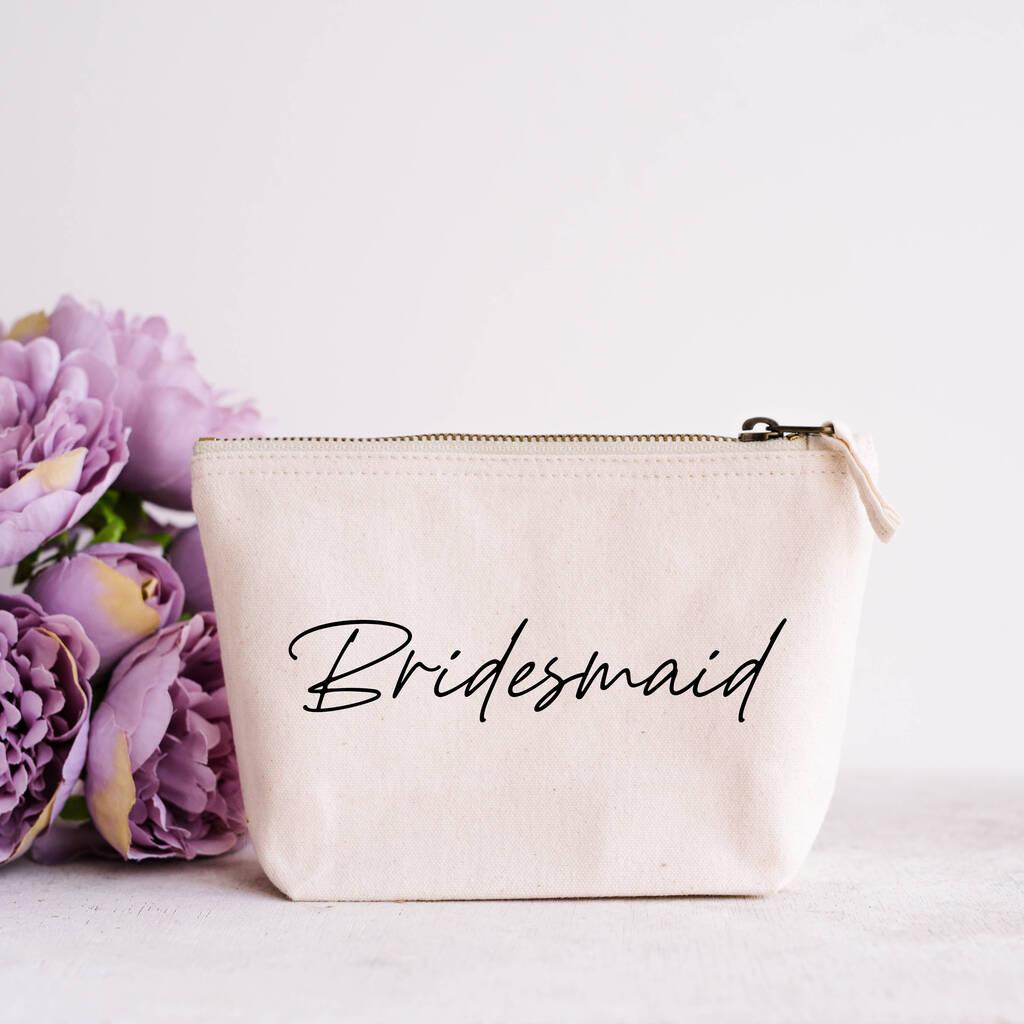 Neutral makeup bag with bridesmaid written on in black lettering