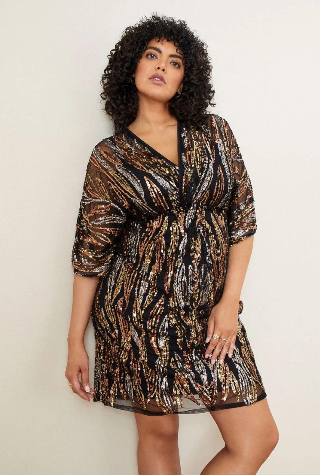 short gold and silver sequinned sparkly bridesmaid dress