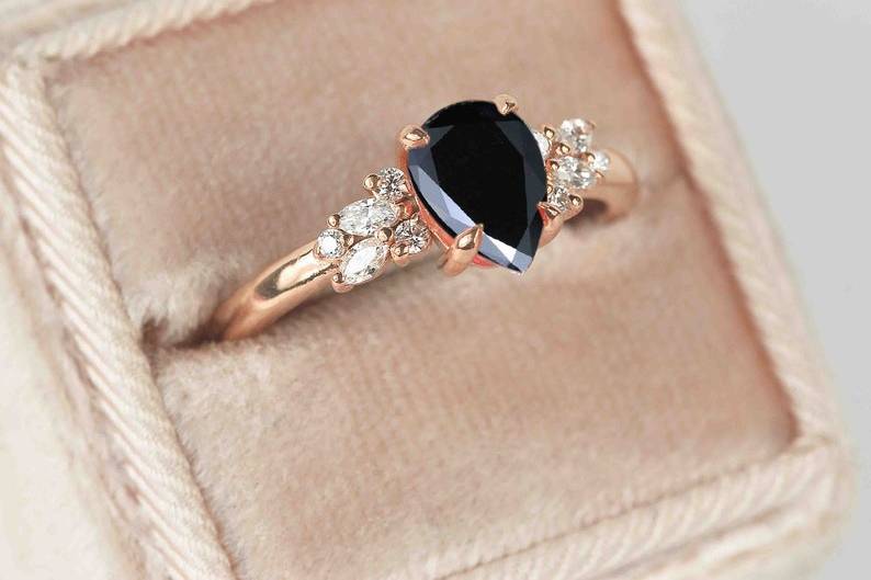 Pear shaped black diamond engagement ring