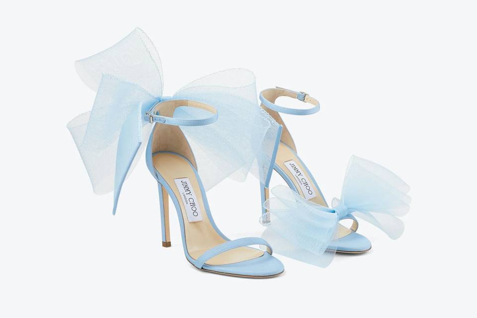 Pale blue designer wedding shoes with oversized tulle bows