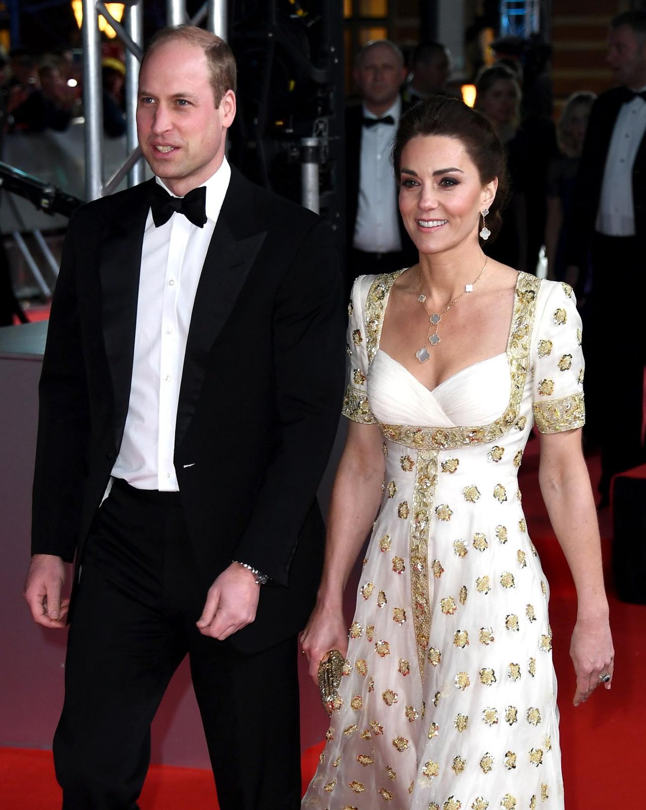 Kate Middleton and Prince William dressed up in a tux and dress