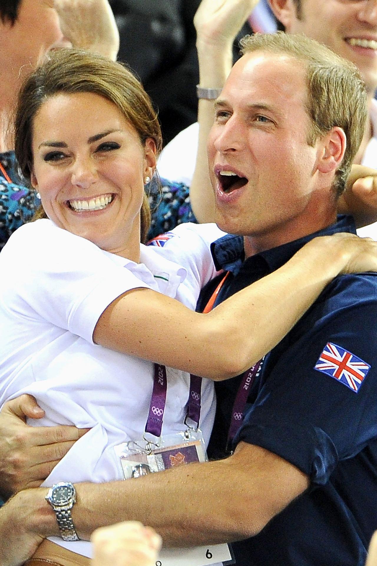 Kate Middleton and Prince William hug and cheer watching the Olympics