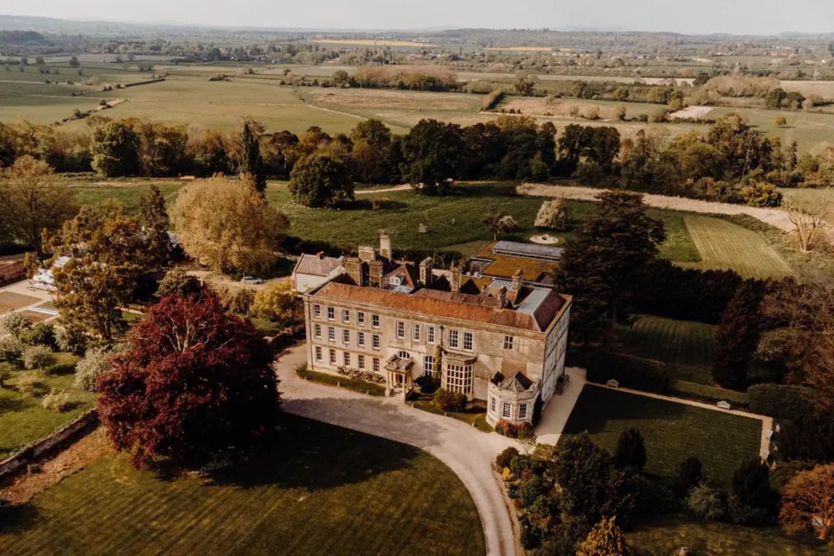 11 an aerial view of the grounds and grand house at elmore court which shows the vast countryside that surrounds the house