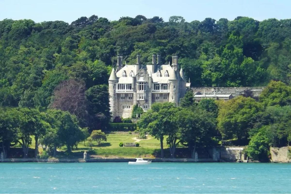 15 A view of chateau rhianfa, a weekend wedding venue set on one side of a gorgeous lake in wales