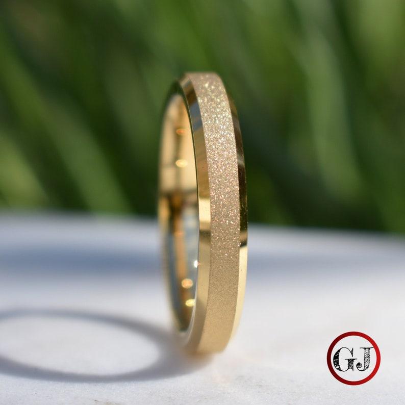 slim yellow gold band with a sparkly sandblasted inlay