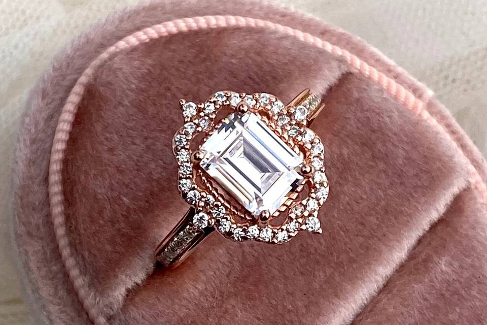 Rose gold temporary proposal ring in a pink box