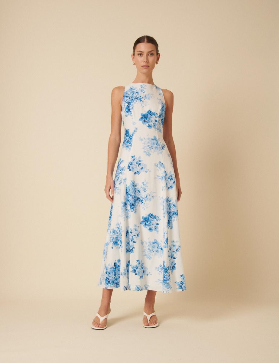 An a-line boat neck dress with blue watercolour floral design