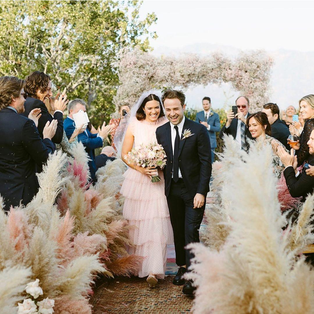 Mandy Moore walking down the aisle at her wedding