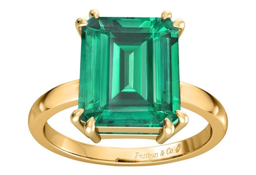 Solitaire emerald engagement ring