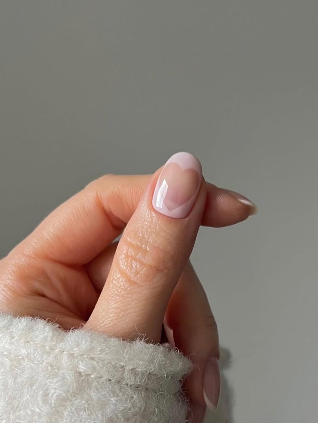 Milky white nails with heart cut out