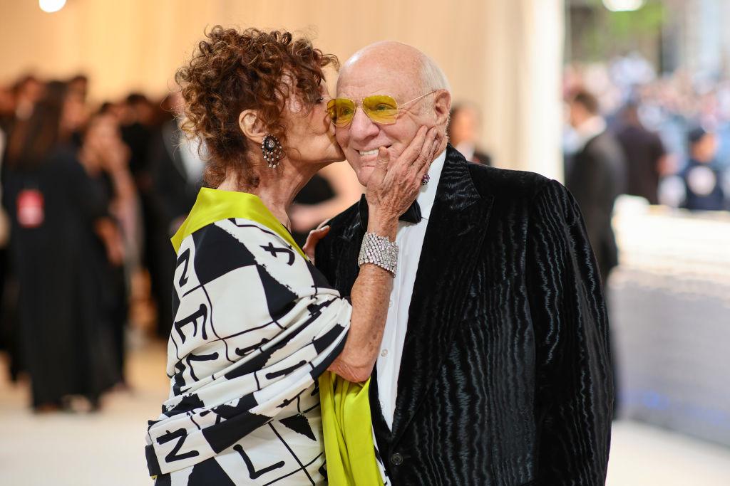 diane von furstenberg kisses her husband on the cheek at an awards