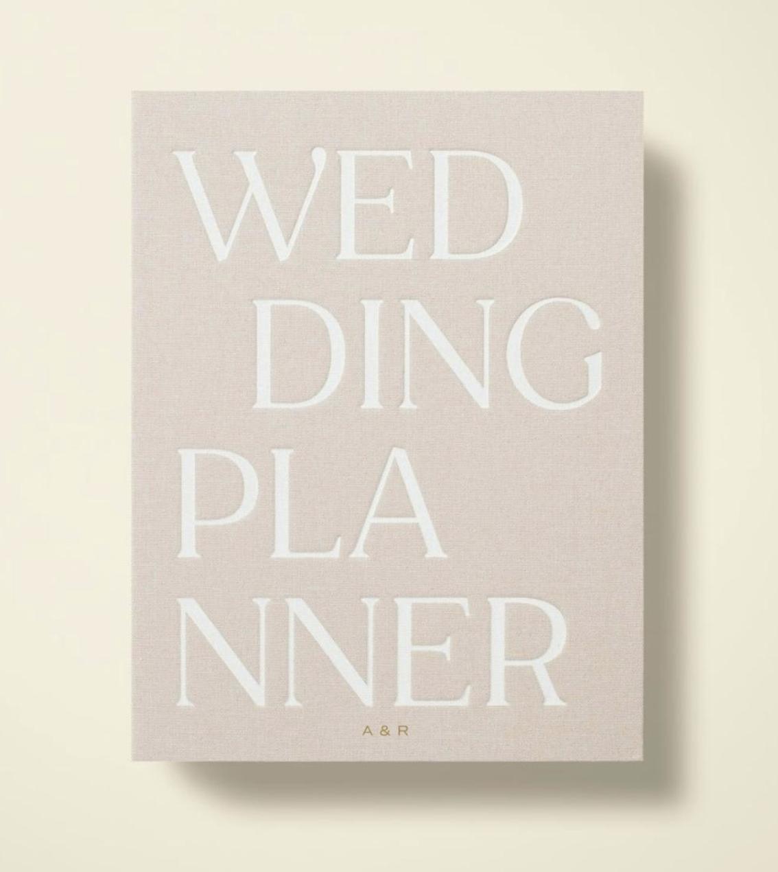 beige white lettering wedding planner from Papier