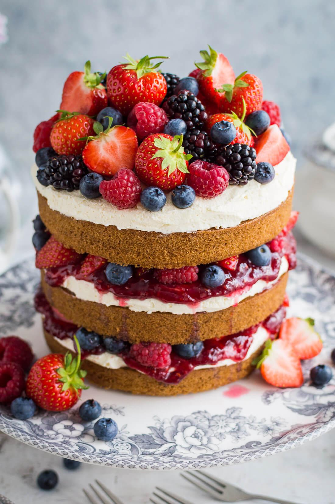 Triple layer victoria sponge rustic wedding back topped with berries