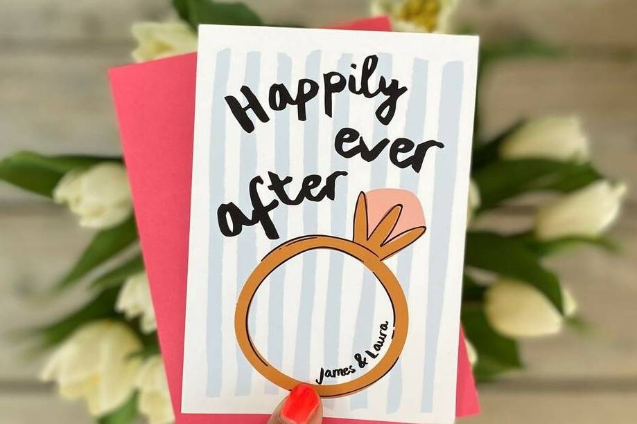 Modern engagement card with the engagement wishes 'Happily ever after' written on it