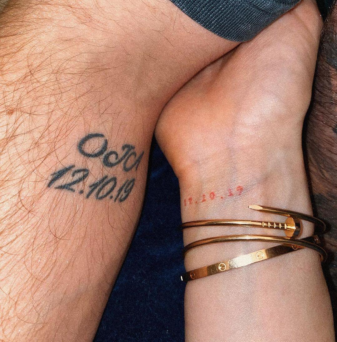 My husband and I got matching tattoos of our wedding date. We've been  together for 12 years, married for 6 months. : r/tattoo