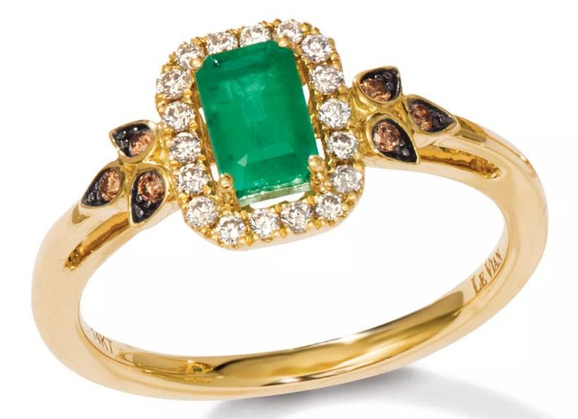 Unusual diamond and emerald engagement ring