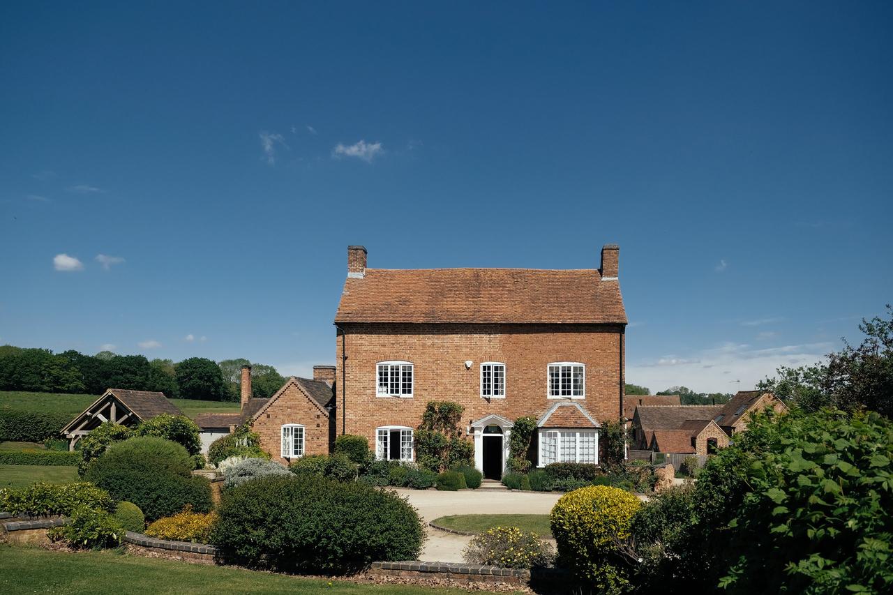 Exterior of a country house wedding venue in Warwickshire.