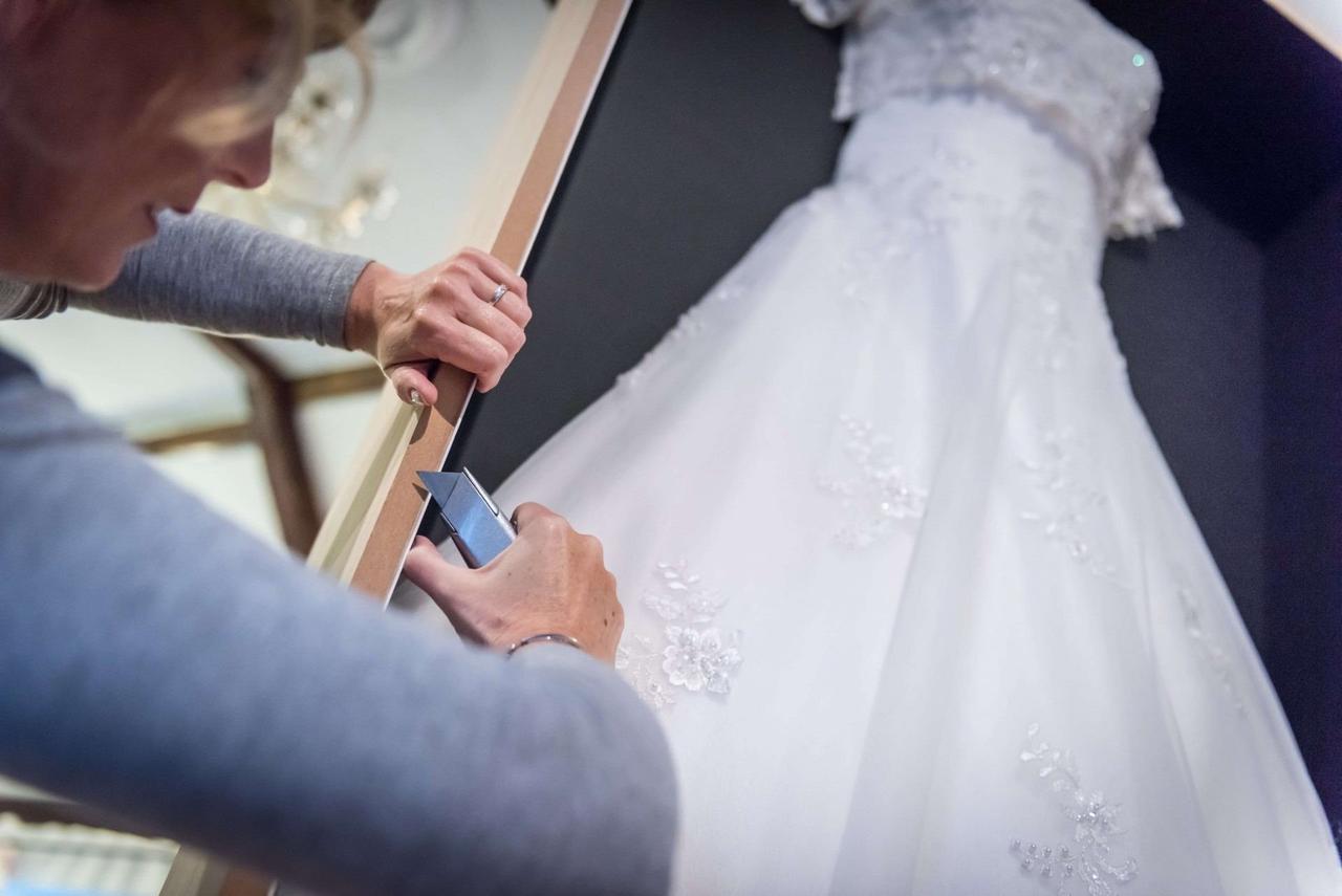 Wedding dress outlet framing cost