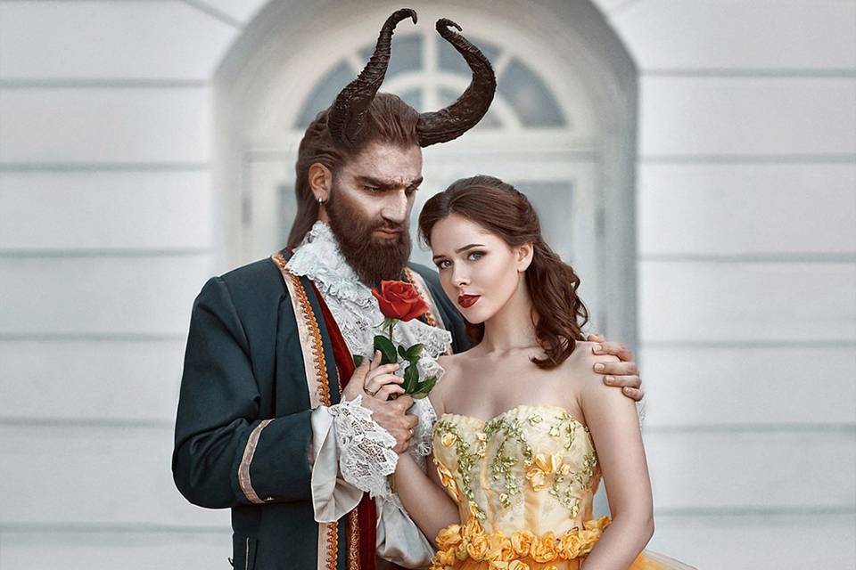 Couple wearing a beauty and the beast disney halloween costume