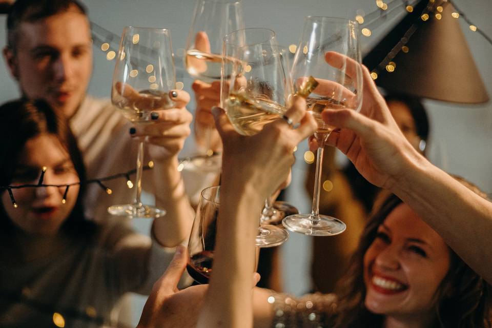 group of people raising a toast at an amazing sten do