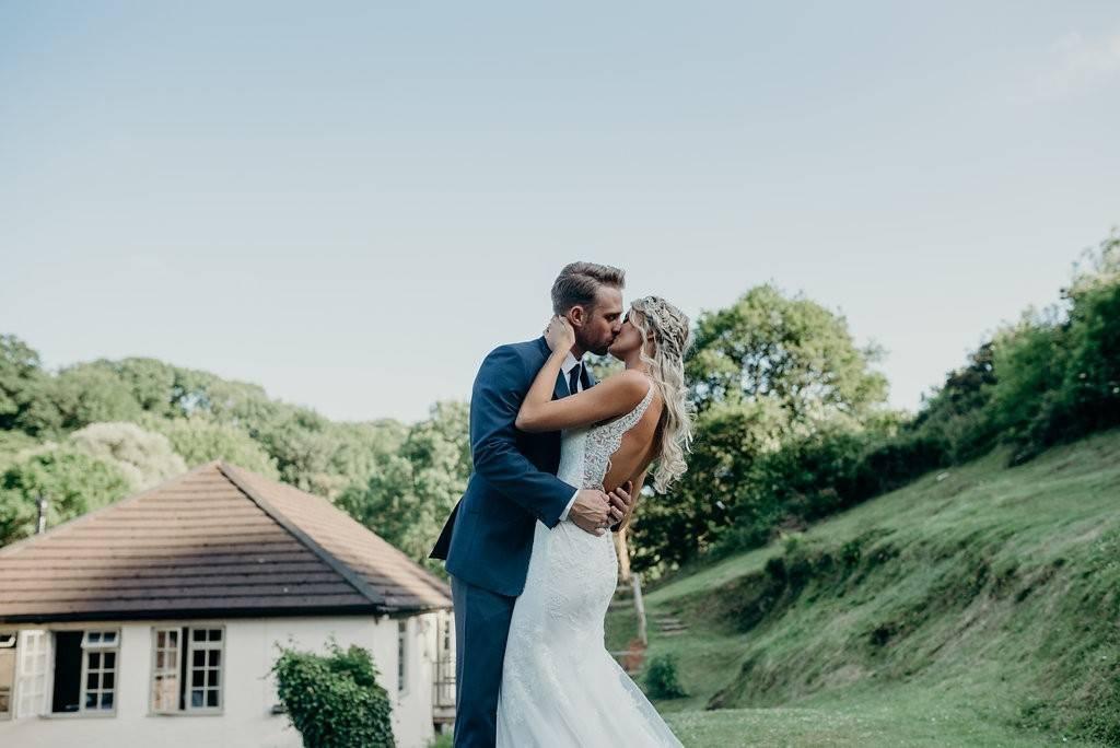 Bride and groom kissing