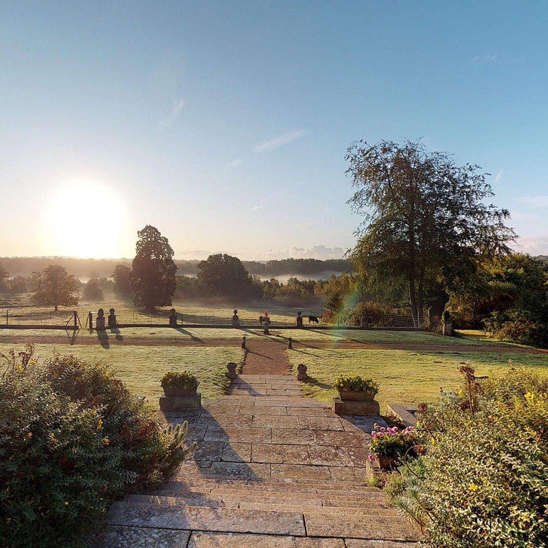 Gardens at Bailbrook House Hotel looking down across stone steps