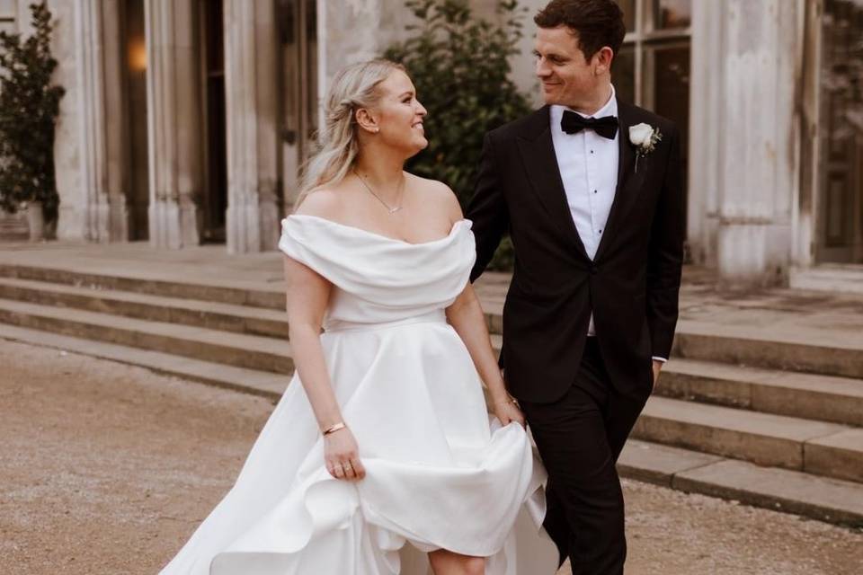 Body positivity campaigner Alex Light and her husband on their wedding day