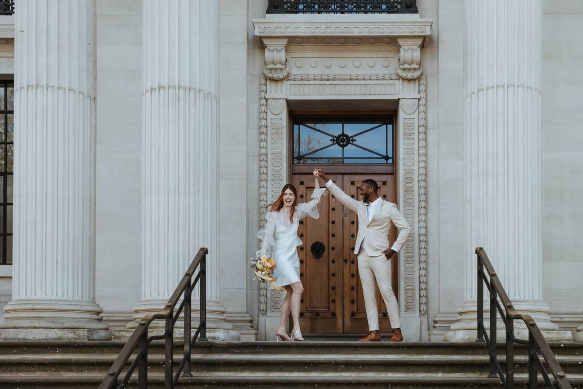 Bride and groom holding hands