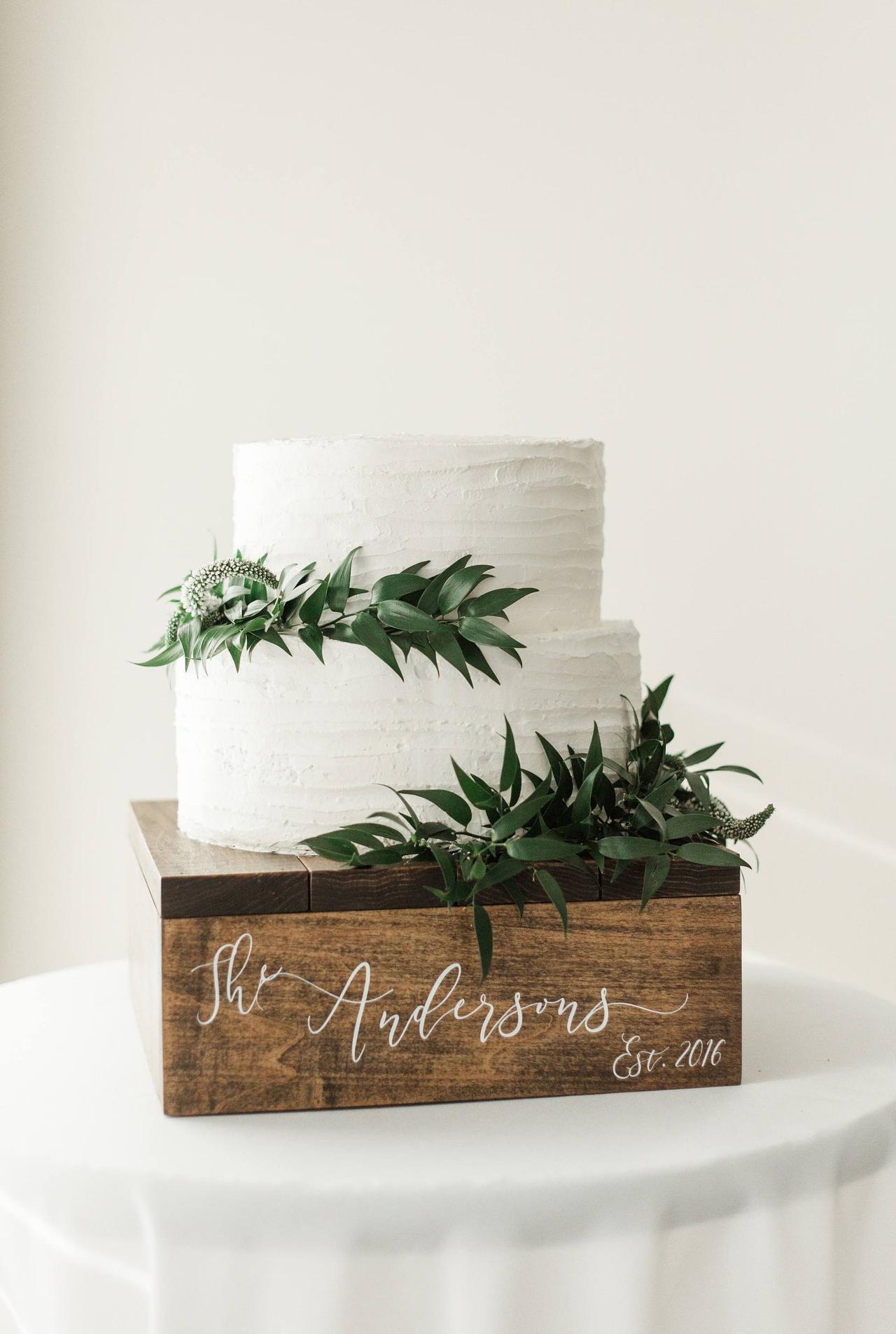 Simple wedding cake with greenery