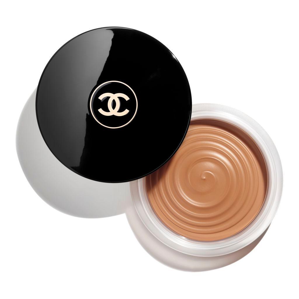 A pot of liquid bronzer with a black lid