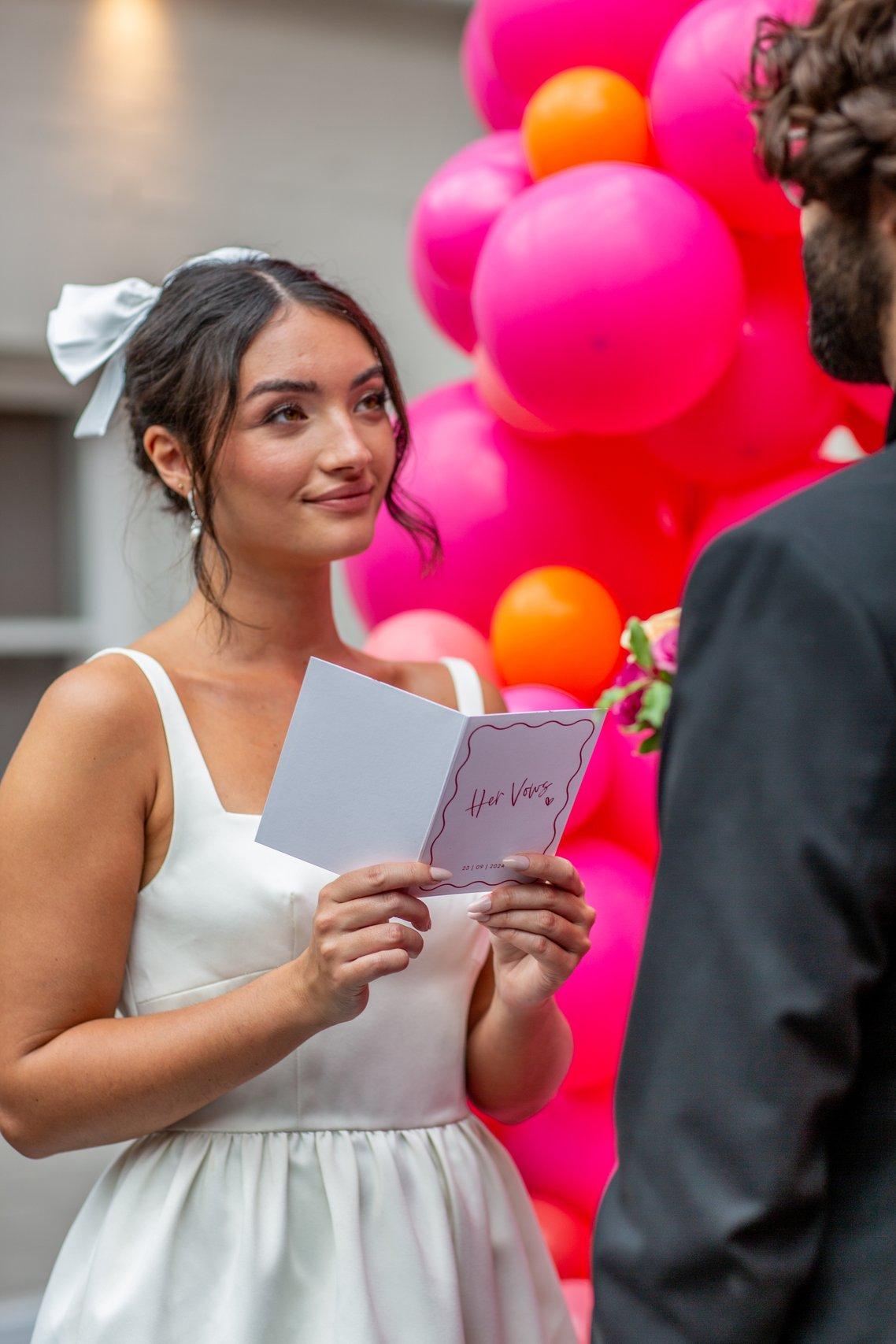 Bride looking at the groom during a micro wedding ceremony
