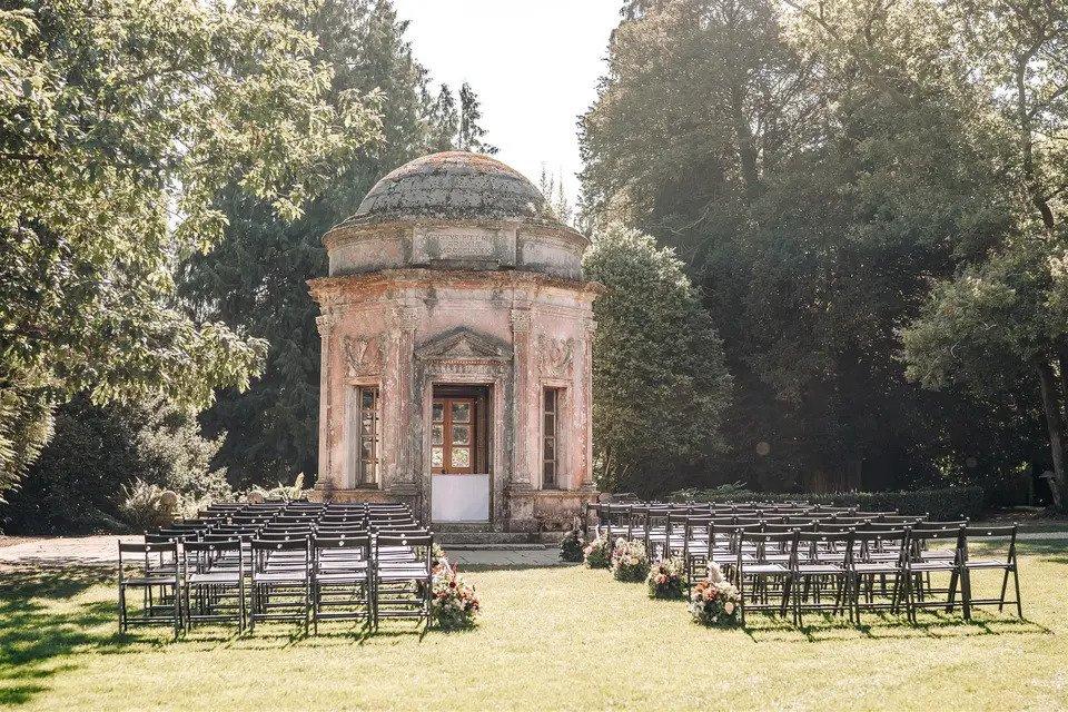Outdoor wedding set up surrounded by trees