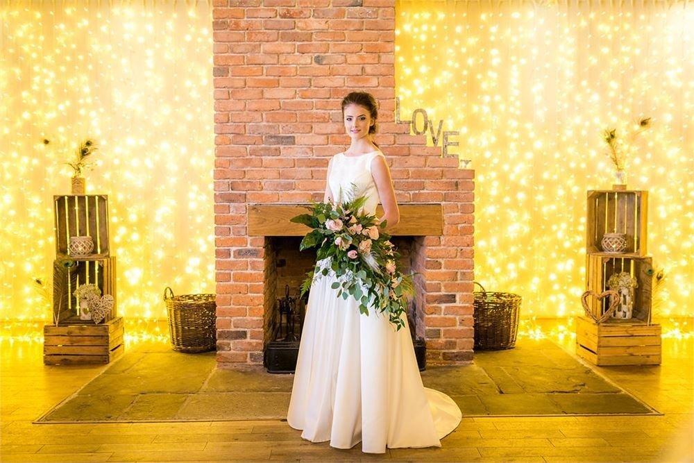 charnock-farm-wedding-venue-with-bride