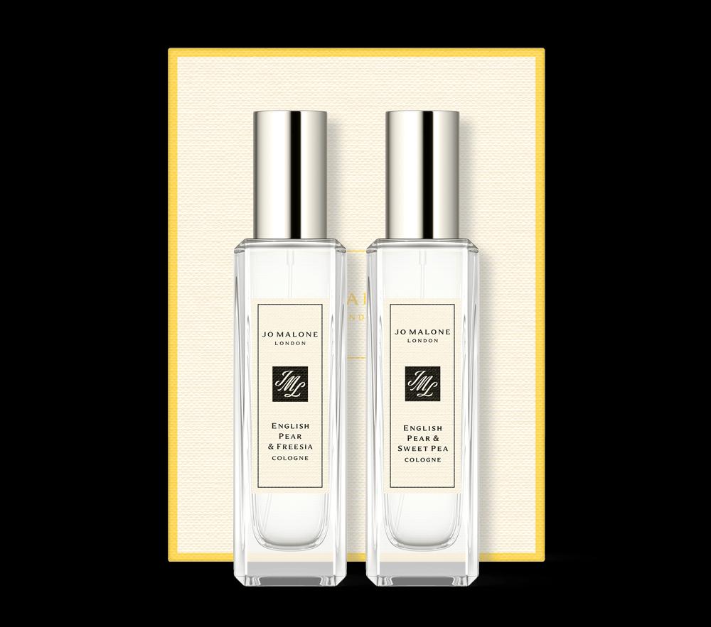 Two Jo Malone English Pear fragrances in front of a gift box.