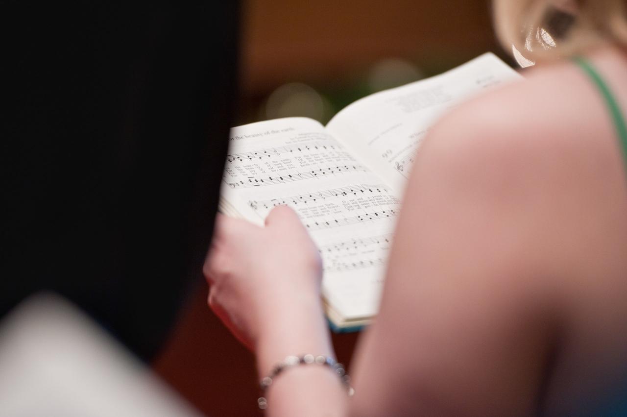 Church wedding, singing hymns and reading the Bible.