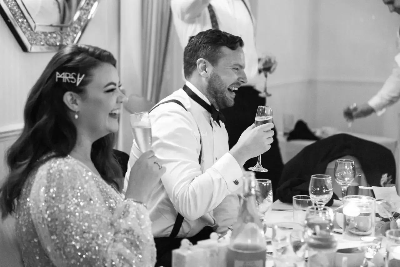 bride and groom smiling at wedding