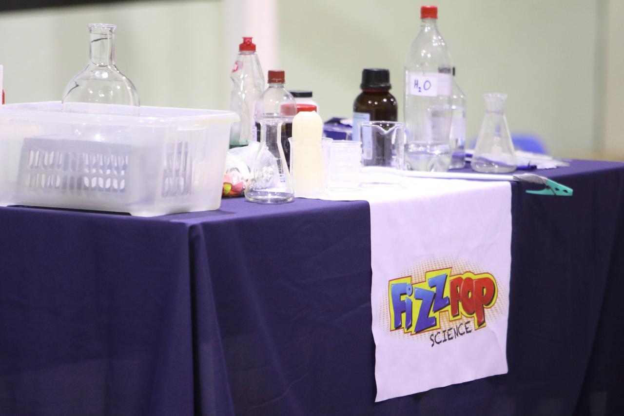 A children's science station set up for entertainment at a wedding