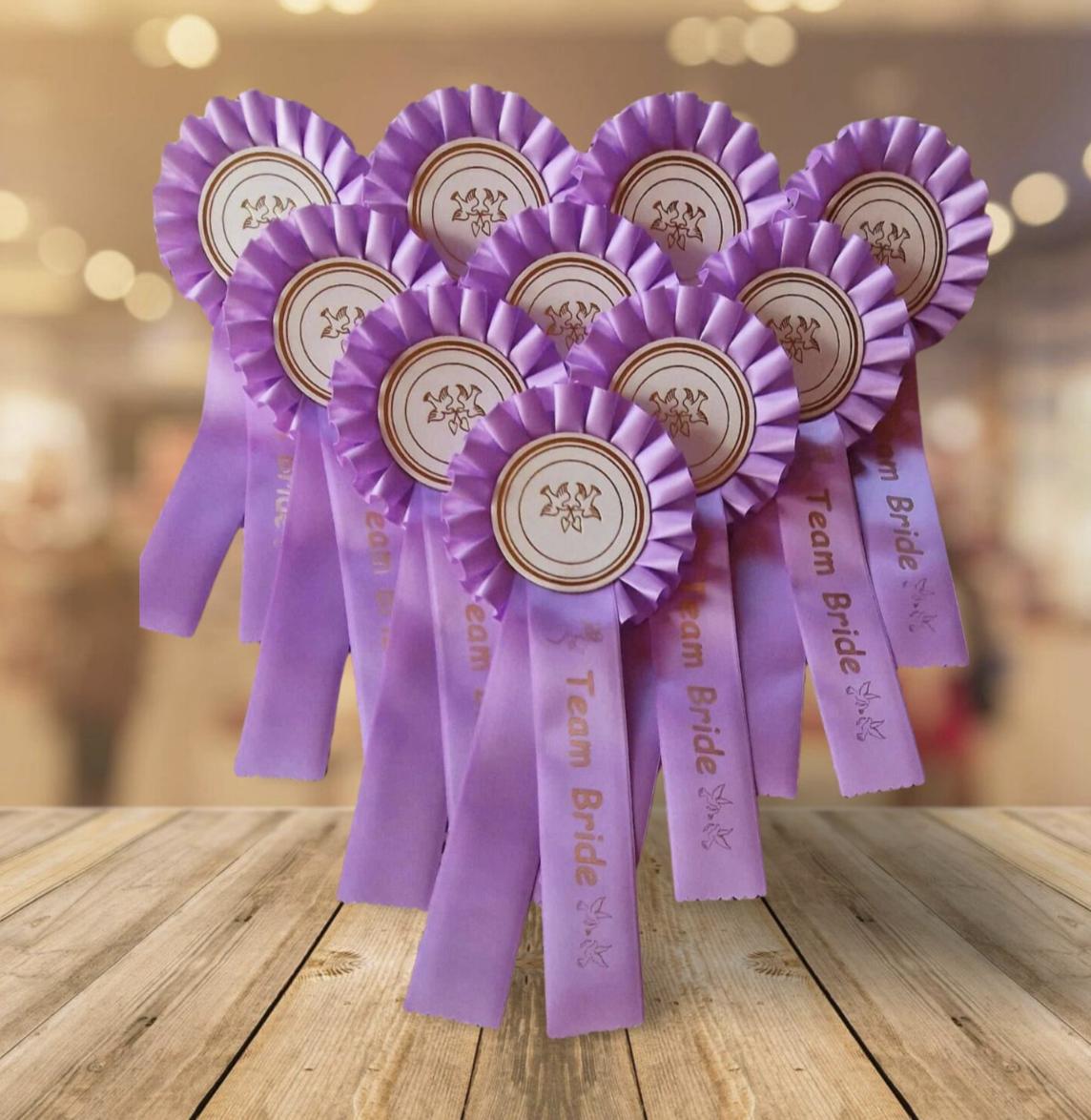 purple hen party rosettes from etsy