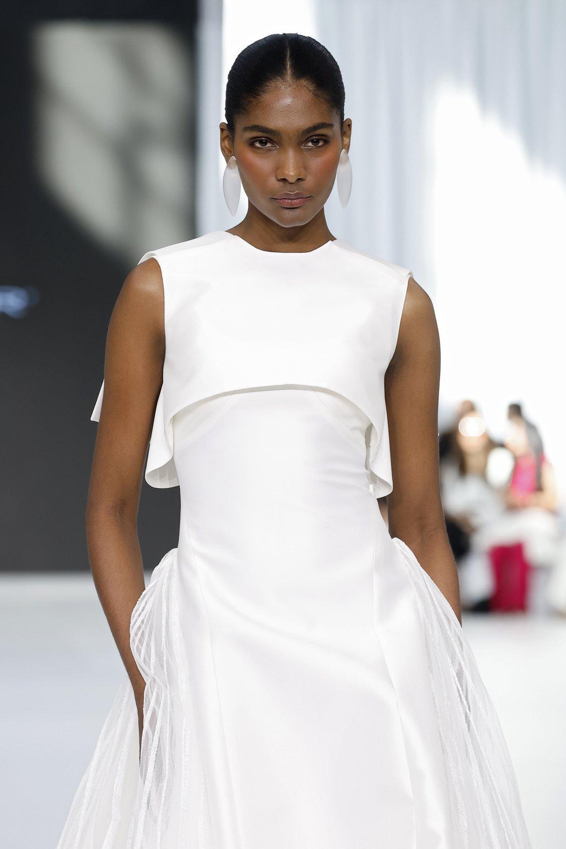 Clean and classic boatneck wedding dress by Peter Langner at Barcelona Bridal Week 2026