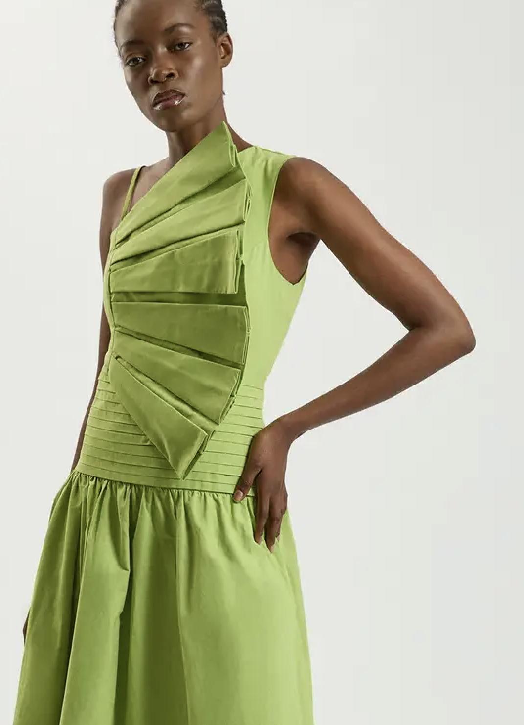 model wearing an apple green 3D sleeveless dress from Karen Millen