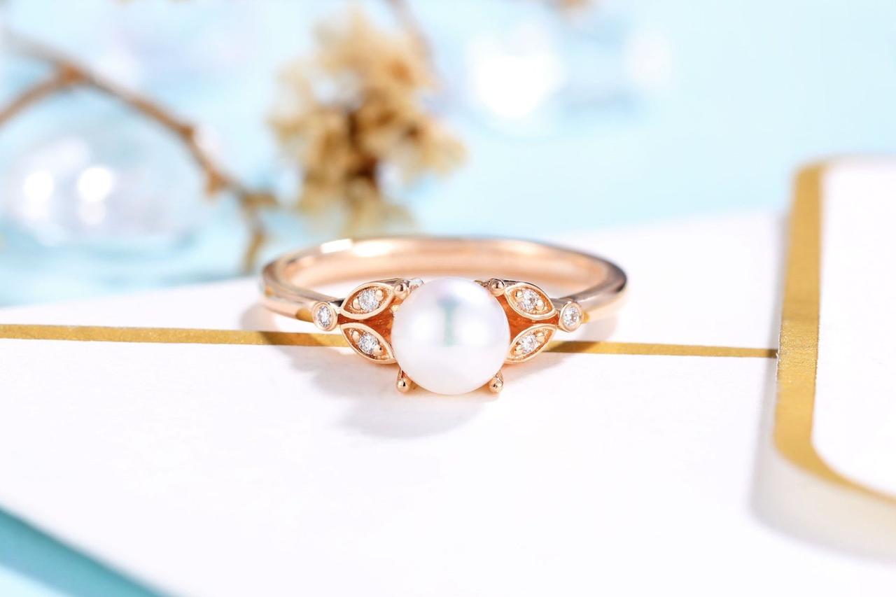 Vintage pearl engagement on sale rings