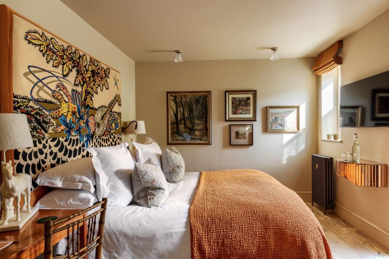boutique bedroom at the George in Rye hotel, luxury bed with modern, cosy decor