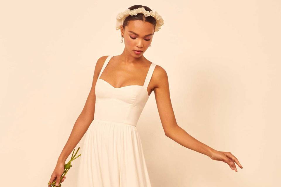 Model in a strappy wedding dress