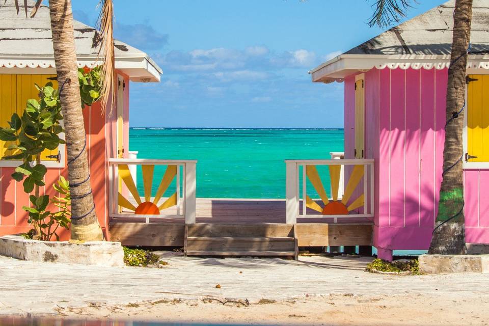 Bright huts on a beach island