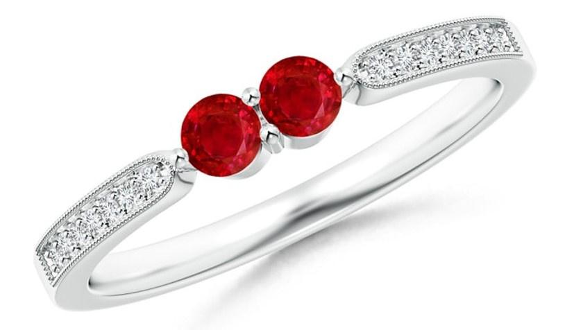 Three stone ruby engagement ring with a diamond band