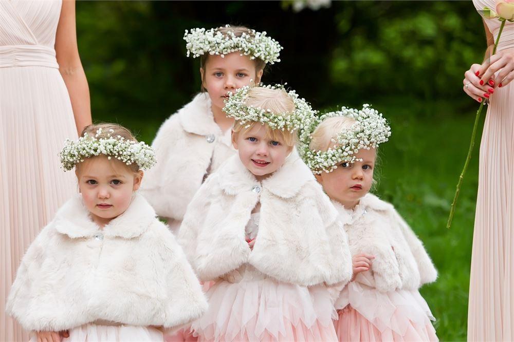 The Meaning Behind the Flower Girl and Ring Bearer Tradition: We